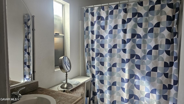 2325 E Pecos Ct, Lancaster, CA 93535 - full bathroom featuring vanity and a shower with curtain
