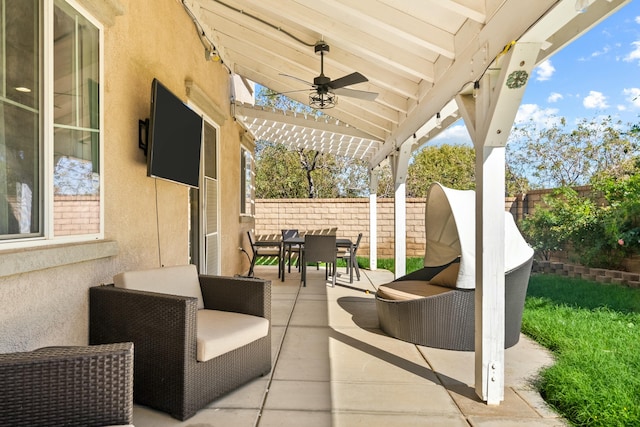 view of patio / terrace featuring ceiling fan