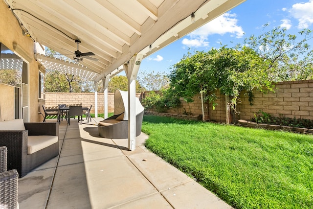 view of patio / terrace featuring ceiling fan