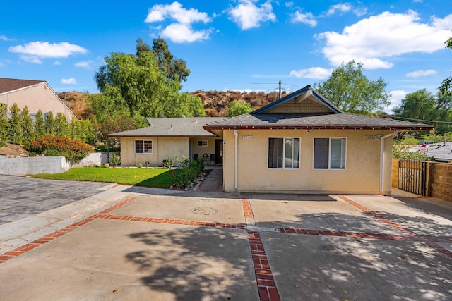 view of front of house with a patio