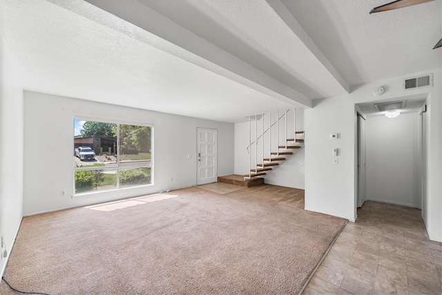 2823 W W Ave Unit J4, Lancaster, CA 93536 - entrance foyer featuring a textured ceiling and stairway