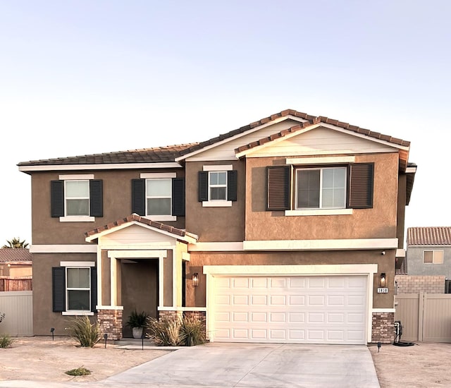 view of front of property with a garage