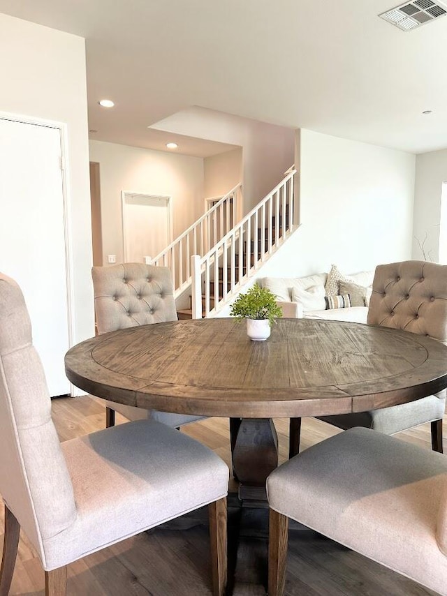 dining area featuring hardwood / wood-style flooring