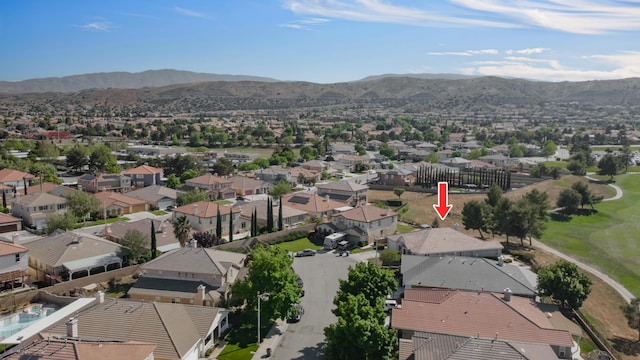 bird's eye view featuring a mountain view and a residential view