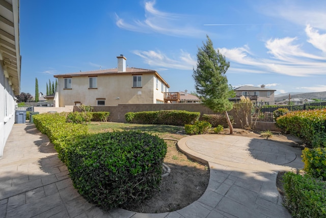 view of yard featuring a fenced backyard and a patio
