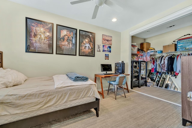 bedroom featuring ceiling fan and carpet