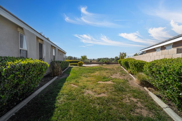 view of yard featuring fence
