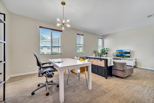 office area with light colored carpet, baseboards, visible vents, and a chandelier