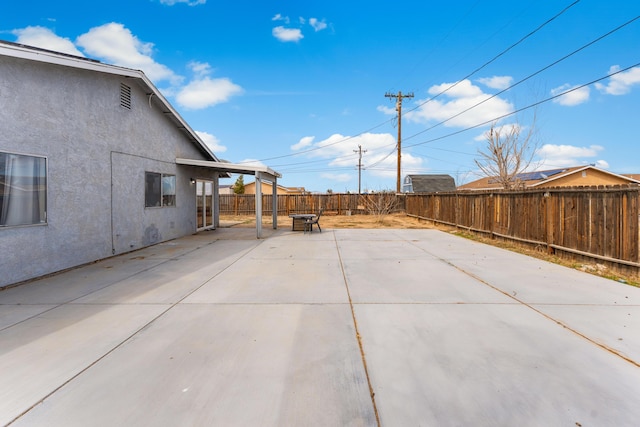 view of patio with a fenced backyard