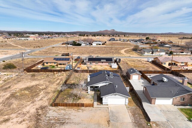 aerial view with a mountain view and a residential view