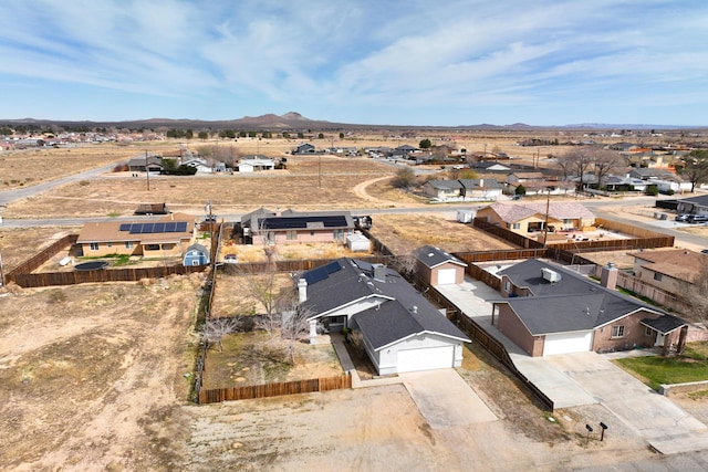 aerial view with a mountain view and a residential view