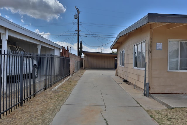 view of side of property with fence