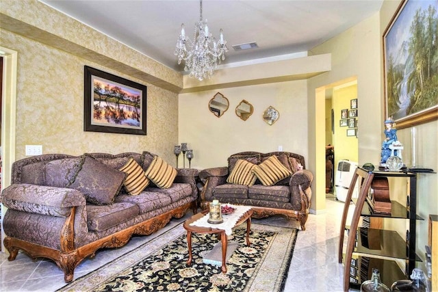 living room with an inviting chandelier