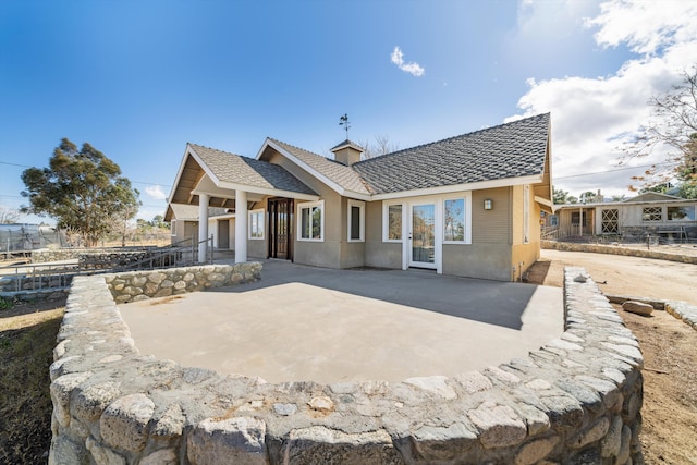 rear view of house with a patio area