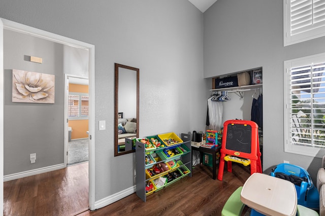 recreation room featuring dark hardwood / wood-style floors