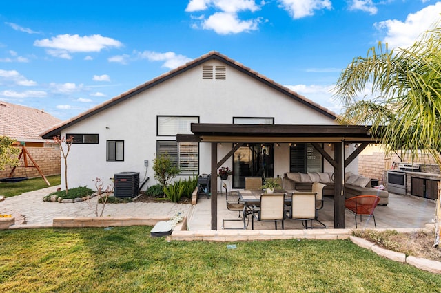 back of property with a lawn, cooling unit, outdoor lounge area, and a patio