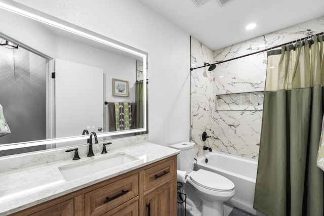 full bathroom featuring toilet, vanity, and shower / tub combo with curtain