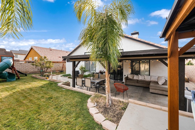 view of yard with a playground, a patio area, and outdoor lounge area