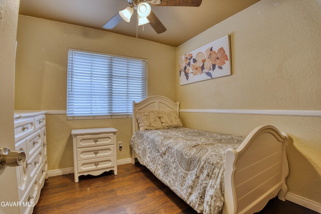 37214 Bunker Ct, Palmdale, CA 93550 - bedroom featuring dark wood-style flooring, a ceiling fan, and a textured wall