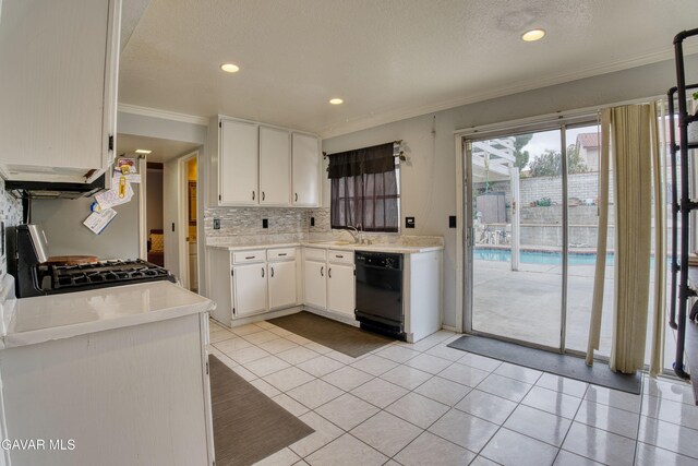37214 Bunker Ct, Palmdale, CA 93550 - kitchen featuring black dishwasher, ornamental molding, range, light countertops, and decorative backsplash