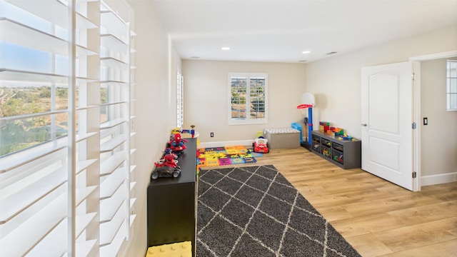 3929 Derby Cir, Quartz Hill, CA 93536 - playroom featuring light wood finished floors, baseboards, and recessed lighting