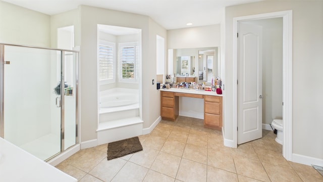 3929 Derby Cir, Quartz Hill, CA 93536 - full bathroom featuring a garden tub, a shower stall, vanity, tile patterned flooring, and toilet