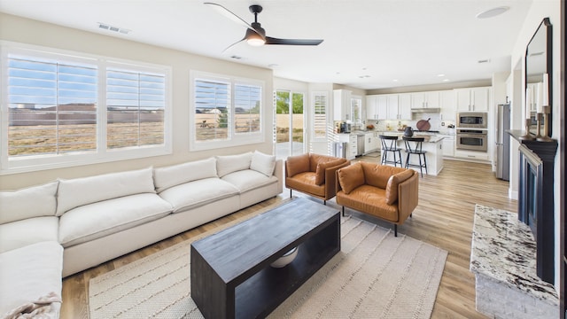 3929 Derby Cir, Quartz Hill, CA 93536 - living area featuring light wood-style floors, a ceiling fan, and recessed lighting