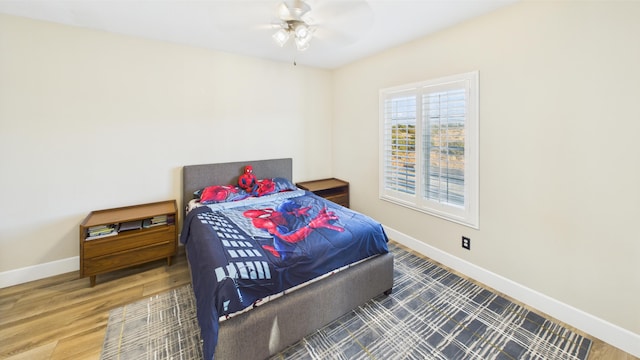 3929 Derby Cir, Quartz Hill, CA 93536 - bedroom featuring wood finished floors, baseboards, and ceiling fan