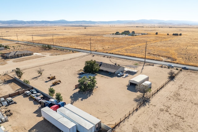 bird's eye view with a mountain view and a rural view