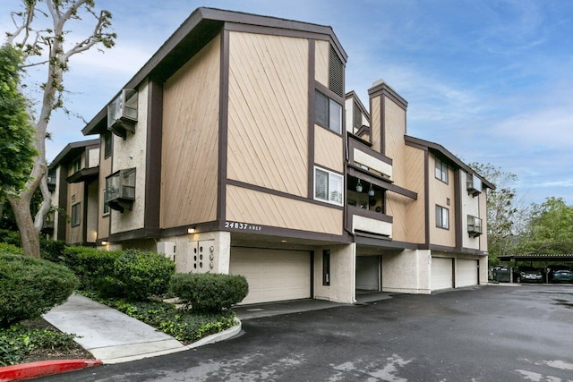 view of property featuring a garage