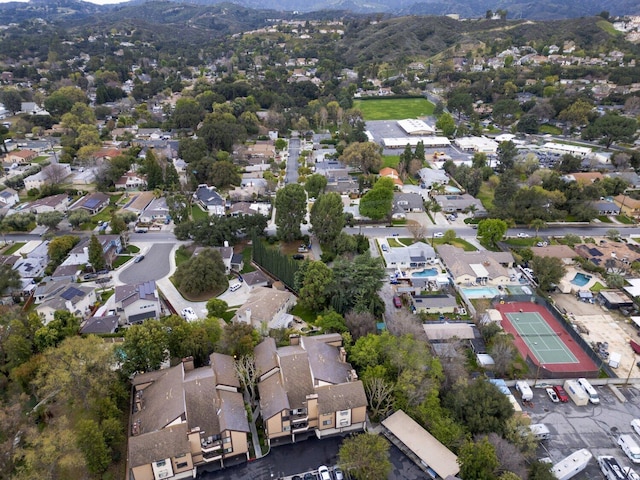 drone / aerial view with a mountain view and a residential view