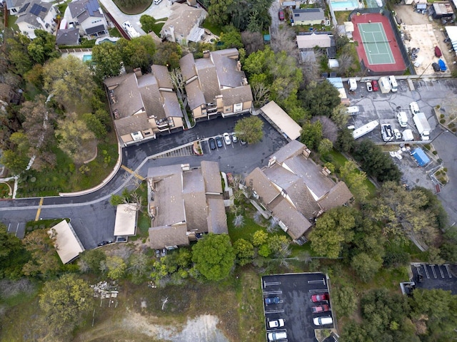 birds eye view of property with a residential view