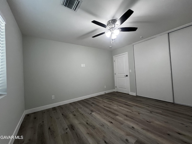 10165 E E Ave Unit S10, Littlerock, CA 93543 - unfurnished bedroom featuring wood finished floors, a closet, and ceiling fan
