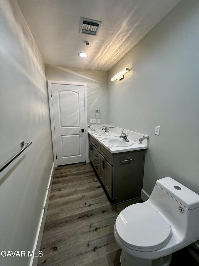 10165 E E Ave Unit S10, Littlerock, CA 93543 - bathroom with wood finished floors and double vanity