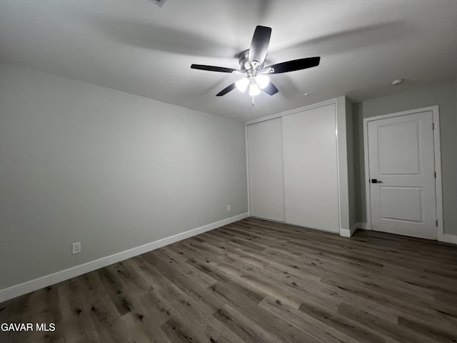 10165 E E Ave Unit S10, Littlerock, CA 93543 - unfurnished bedroom with wood finished floors, a closet, and ceiling fan
