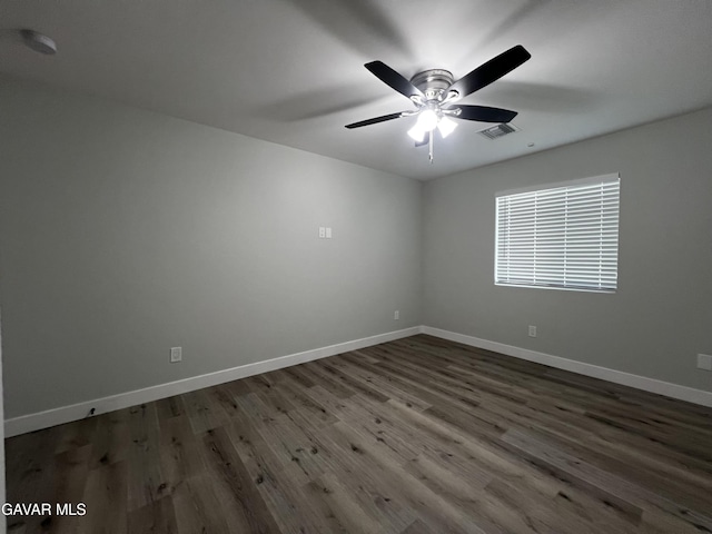 10165 E E Ave Unit S10, Littlerock, CA 93543 - spare room with dark wood-style floors and a ceiling fan