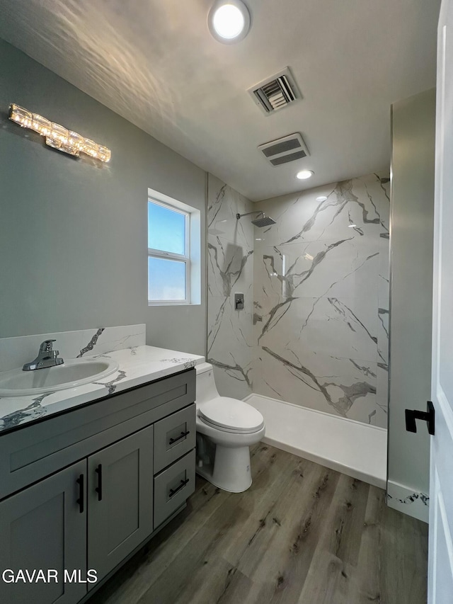 10165 E E Ave Unit S10, Littlerock, CA 93543 - bathroom with a marble finish shower, vanity, and wood finished floors