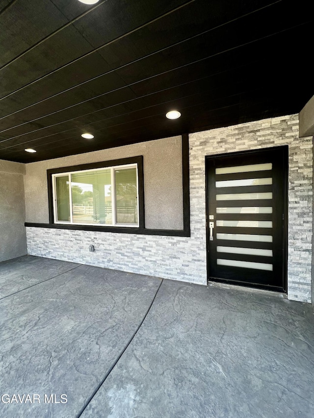 10165 E E Ave Unit S10, Littlerock, CA 93543 - view of exterior entry with a patio