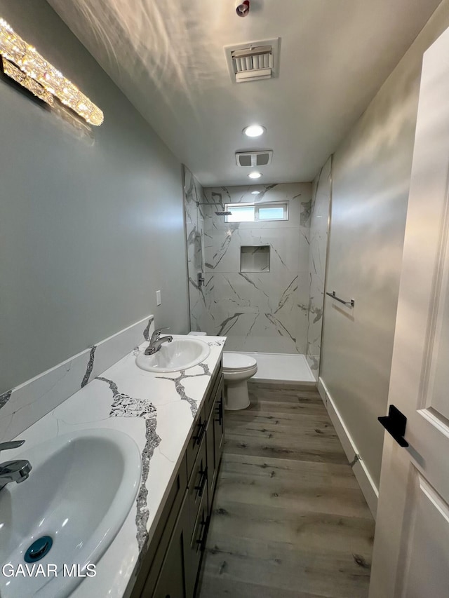 10165 E E Ave Unit S10, Littlerock, CA 93543 - full bath featuring a marble finish shower, double vanity, and wood finished floors