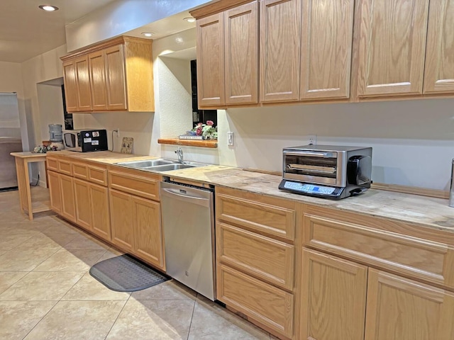 42930 Lake Hughes Rd, Lake Hughes, CA 93532 - kitchen with sink, light tile patterned floors, stainless steel appliances, and light brown cabinetry