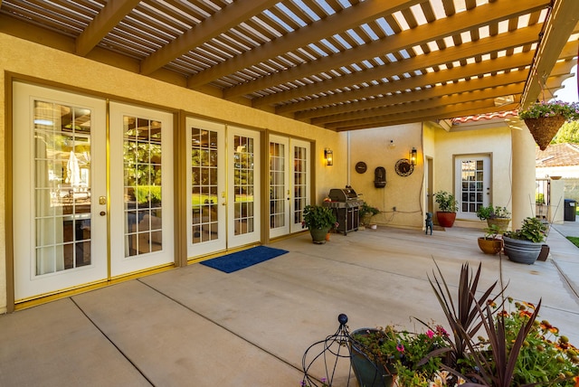 view of patio / terrace featuring a pergola and grilling area