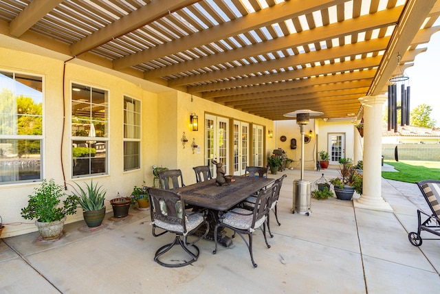 view of patio / terrace with a pergola and french doors