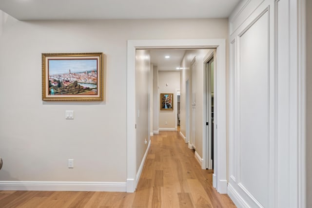 hallway featuring light wood-type flooring