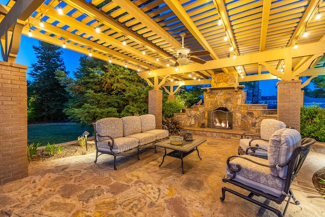 view of patio featuring an outdoor living space with a fireplace and a pergola