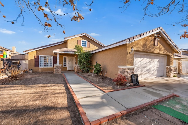 view of front of property with a garage