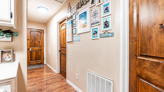 2839 Minford St, Lancaster, CA 93536 - corridor with light wood finished floors and baseboards