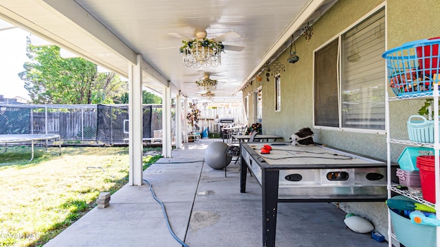 2839 Minford St, Lancaster, CA 93536 - fenced backyard with a trampoline, a patio, ceiling fan, and grilling area