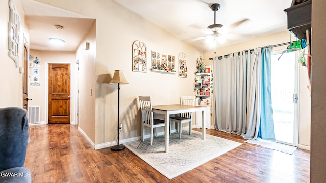 2839 Minford St, Lancaster, CA 93536 - dining space with ceiling fan, wood finished floors, and vaulted ceiling