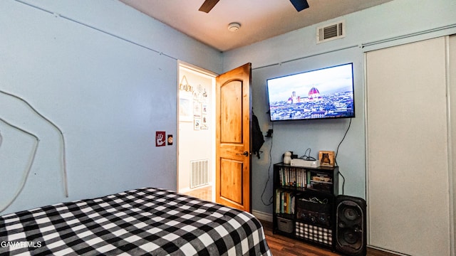 2839 Minford St, Lancaster, CA 93536 - bedroom with dark wood-style flooring, ceiling fan, and a closet