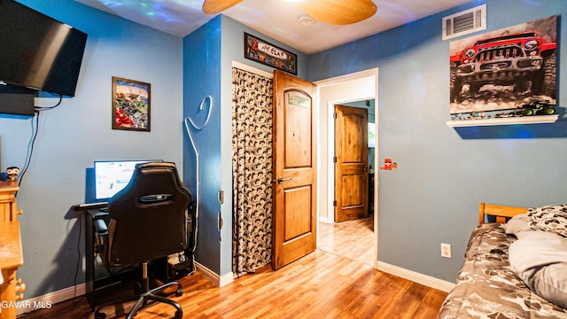2839 Minford St, Lancaster, CA 93536 - bedroom with wood finished floors and an office area
